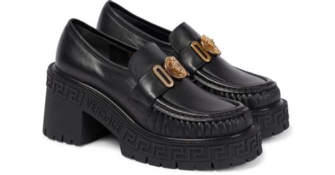 versace women's loafers.